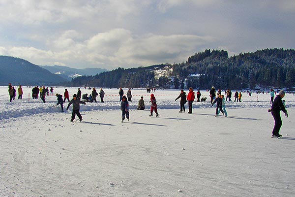 Ice skating on a frozen lake